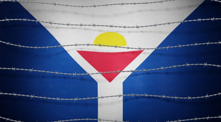 Panneau signalant la frontière entre les parties française et néerlandaise de Saint-Martin.